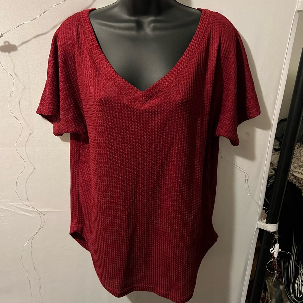 Lovely red blouse.